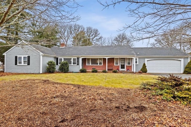 ranch-style house featuring an attached garage, a chimney, a front lawn, and brick siding