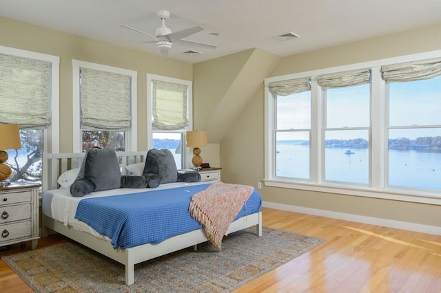 5 Oak Hill Rd, Wareham, MA 02571 - bedroom featuring multiple windows, wood finished floors, baseboards, and a ceiling fan