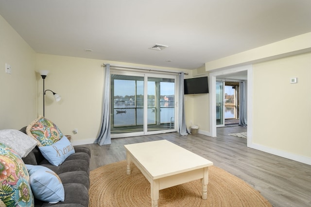 living room with hardwood / wood-style flooring