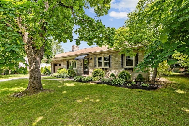 16 Sheldon Ave, Easthampton, MA 01027 - single story home with stone siding, a garage, a chimney, and a front lawn