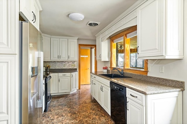 16 Sheldon Ave, Easthampton, MA 01027 - kitchen featuring appliances with stainless steel finishes, white cabinetry, and decorative backsplash