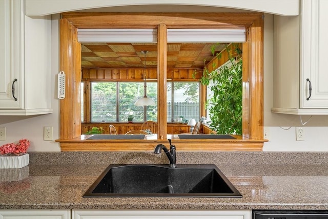 16 Sheldon Ave, Easthampton, MA 01027 - kitchen with dishwasher, white cabinets, and dark stone countertops