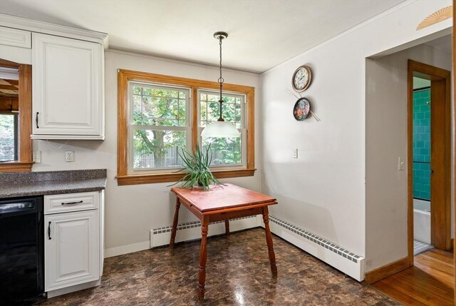 16 Sheldon Ave, Easthampton, MA 01027 - kitchen with black dishwasher, dark countertops, plenty of natural light, white cabinets, and crown molding