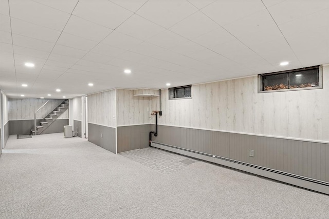 16 Sheldon Ave, Easthampton, MA 01027 - finished basement featuring baseboard heating, carpet floors, stairs, recessed lighting, and a wainscoted wall
