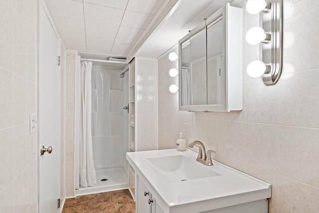 16 Sheldon Ave, Easthampton, MA 01027 - full bath featuring tile walls, a stall shower, and vanity