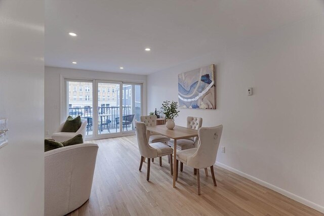 dining area featuring baseboards, recessed lighting, and light wood-style flooring
