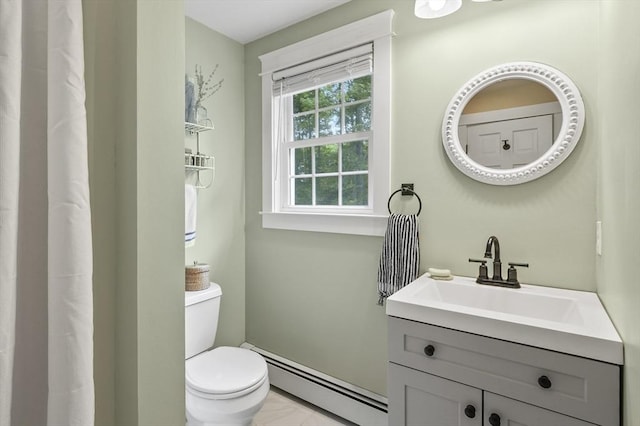 6 Lous Dr, Dudley, MA 01571 - bathroom with baseboard heating, vanity, and marble look tile flooring
