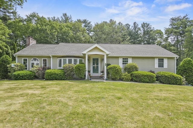 6 Lous Dr, Dudley, MA 01571 - ranch-style house with a chimney, a front lawn, and view of wooded area