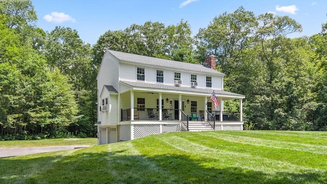 45 A F Putnam Rd, Charlton, MA 01507 - view of front of property featuring a garage, a porch, a chimney, a front lawn, and ceiling fan