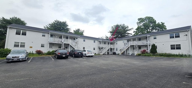 1 Wysocki Dr Unit 9, Dudley, MA 01571 - view of building exterior with stairs and uncovered parking
