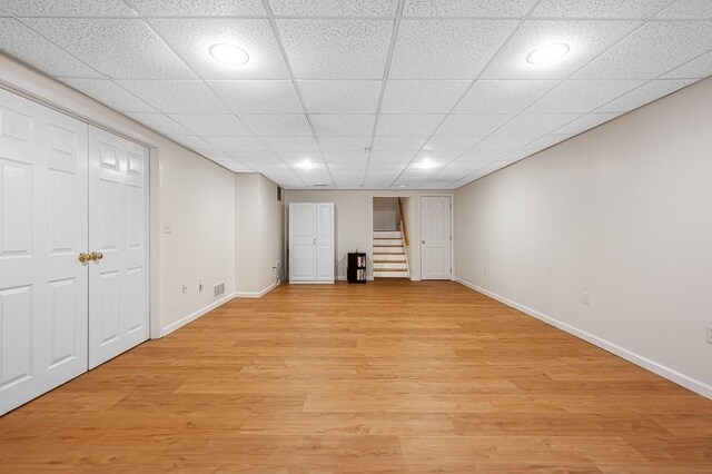 unfurnished bedroom featuring baseboards, light wood-style floors, and recessed lighting