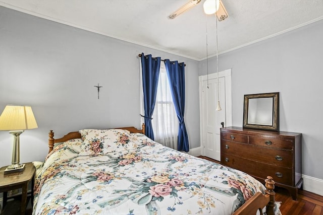 bedroom with ceiling fan and dark hardwood / wood-style flooring