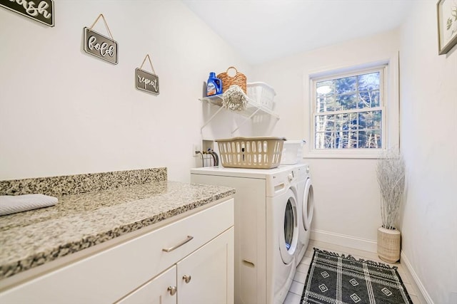 washroom with tile patterned flooring and independent washer and dryer