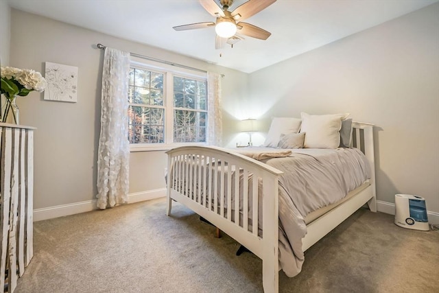 bedroom with ceiling fan and carpet