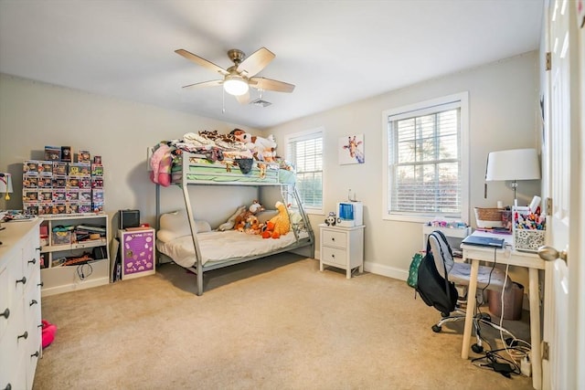 carpeted bedroom with ceiling fan