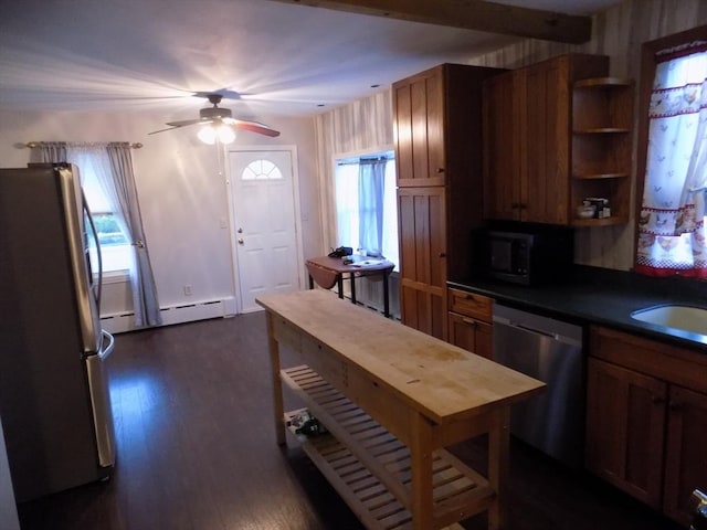 kitchen featuring stainless steel appliances, a baseboard radiator, dark countertops, open shelves, and dark wood-type flooring