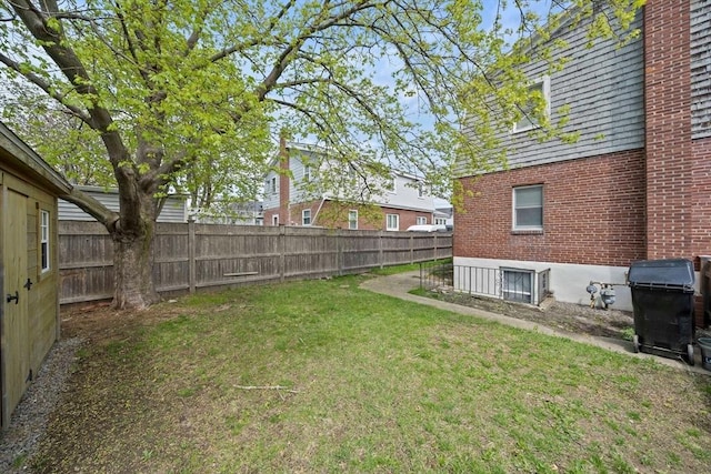 view of yard featuring a fenced backyard