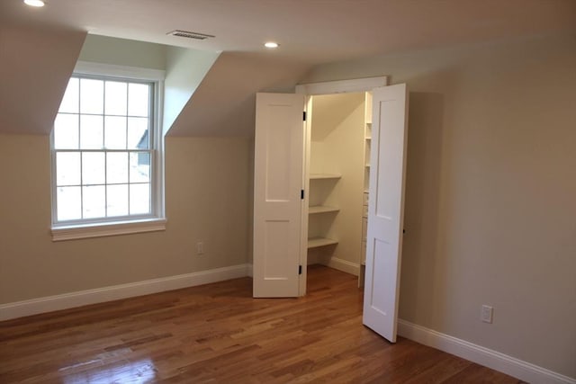6 Lovis Ave, Wakefield, MA 01880 - additional living space with baseboards, wood finished floors, visible vents, and recessed lighting