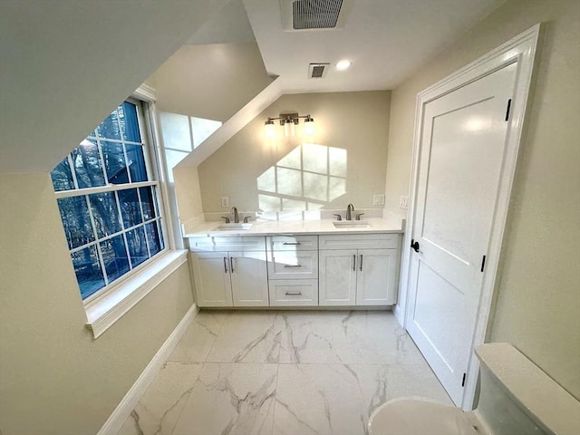 6 Lovis Ave, Wakefield, MA 01880 - full bathroom featuring visible vents, marble finish floor, baseboards, and a sink