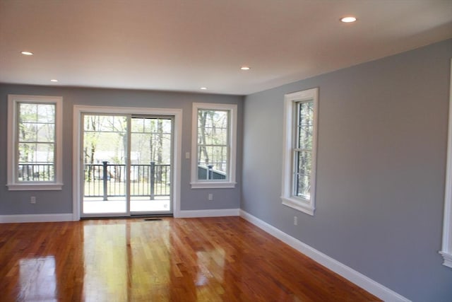 6 Lovis Ave, Wakefield, MA 01880 - doorway with recessed lighting, wood finished floors, and baseboards