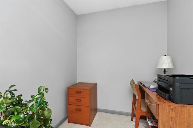 office area featuring baseboards