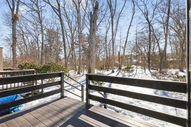 view of snow covered deck