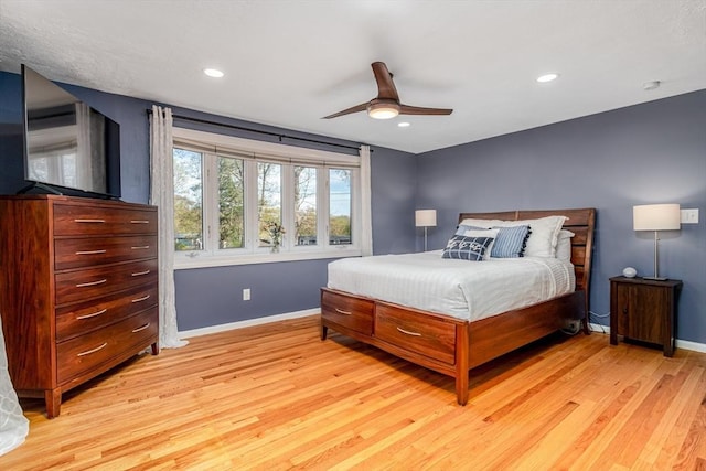 bedroom with baseboards, recessed lighting, light wood finished floors, and ceiling fan