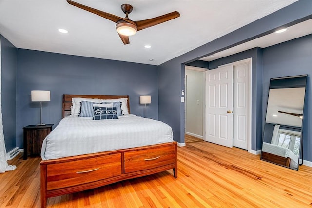bedroom featuring a ceiling fan, baseboards, recessed lighting, and light wood-type flooring