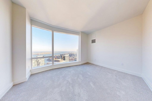 240 Devonshire St Unit 3708, Boston, MA 02110 - carpeted empty room with baseboards
