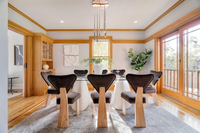 interior space featuring ornamental molding, wood finished floors, and recessed lighting