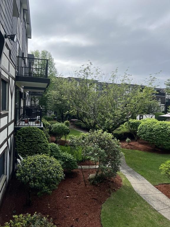 9 Broadway Unit 210, Saugus, MA 01906 - view of yard featuring a balcony