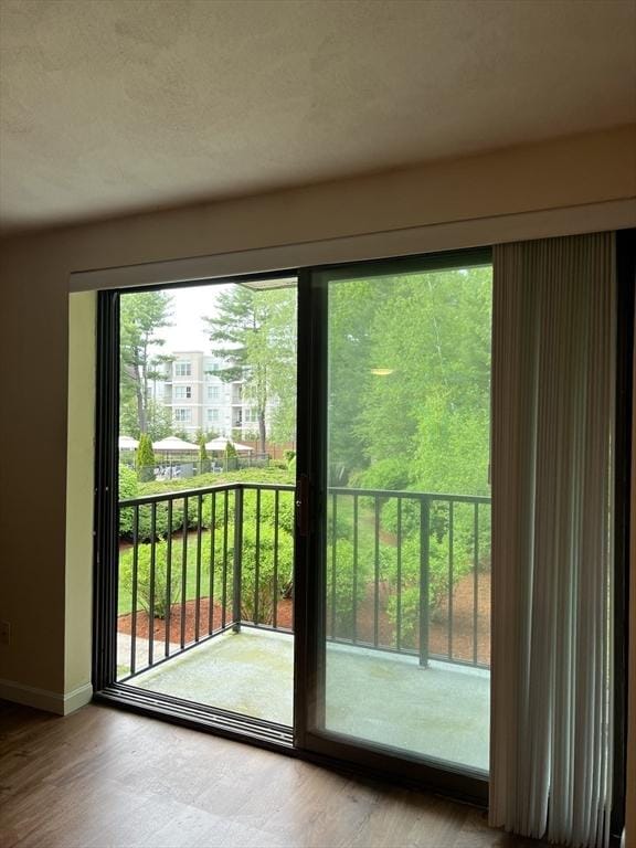 9 Broadway Unit 210, Saugus, MA 01906 - doorway to outside featuring baseboards