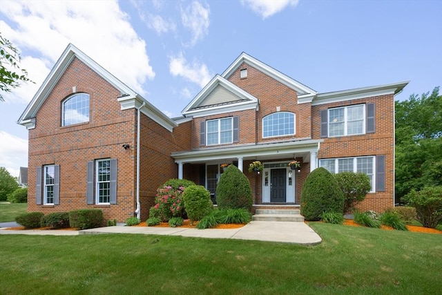 3 Lexington Dr, Walpole, MA 02032 - traditional-style house featuring brick siding and a front lawn