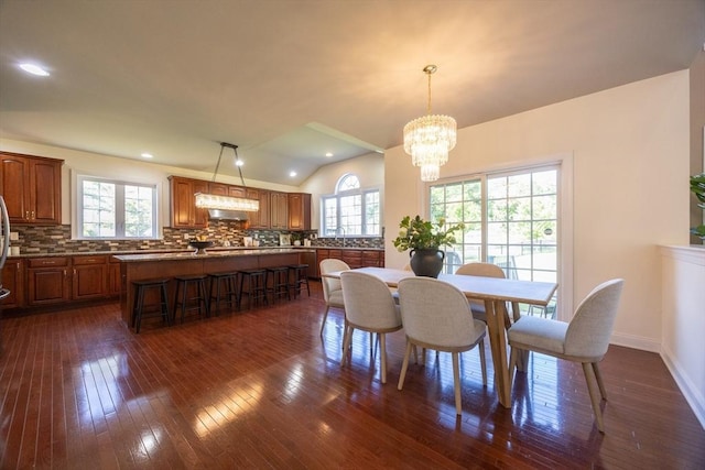 3 Lexington Dr, Walpole, MA 02032 - dining area with healthy amount of natural light, vaulted ceiling, a chandelier, and dark wood finished floors
