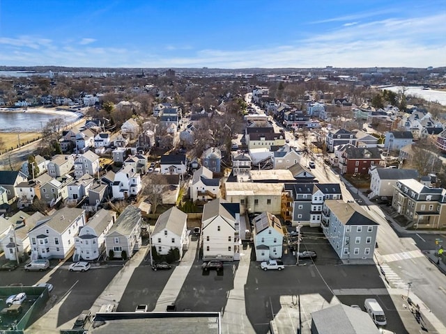 bird's eye view featuring a residential view and a water view