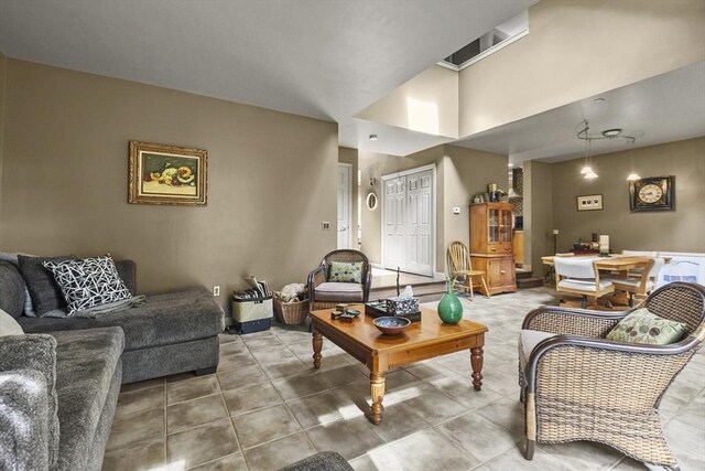 living room with tile patterned flooring