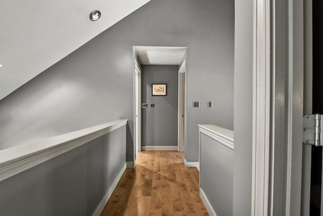 hall with light hardwood / wood-style flooring