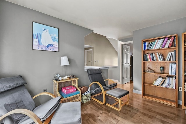 sitting room with hardwood / wood-style floors