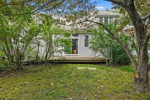 view of yard featuring a wooden deck