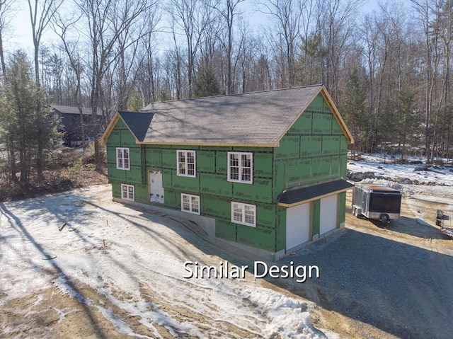 exterior space with a garage and driveway