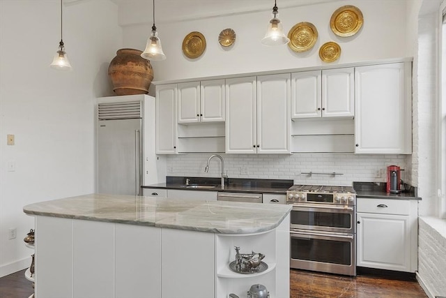 150 Moody St Unit 34, Waltham, MA 02453 - kitchen featuring open shelves, stainless steel appliances, a sink, and decorative backsplash