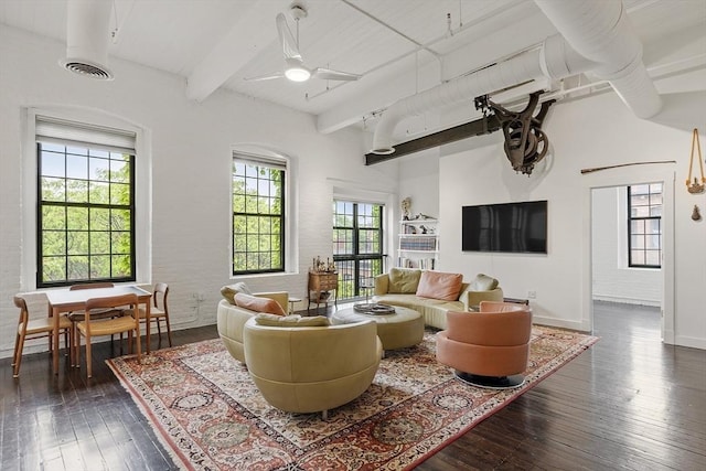 150 Moody St Unit 34, Waltham, MA 02453 - living area with dark wood-type flooring, beam ceiling, baseboards, and ceiling fan