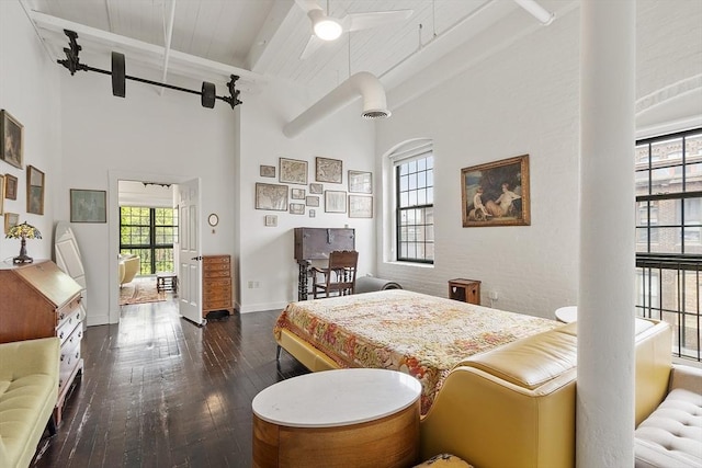 150 Moody St Unit 34, Waltham, MA 02453 - bedroom featuring dark wood-style flooring, a high ceiling, baseboards, and wood ceiling with exposed beams