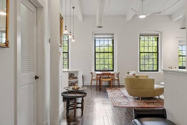150 Moody St Unit 34, Waltham, MA 02453 - living room with beam ceiling and dark wood-type flooring
