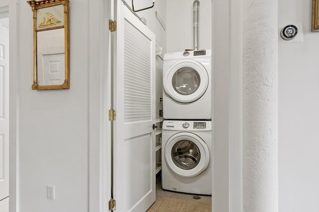150 Moody St Unit 34, Waltham, MA 02453 - washroom featuring stacked washer / dryer