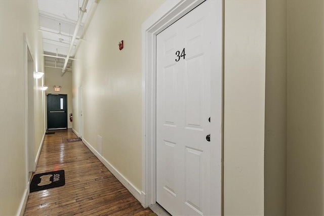 150 Moody St Unit 34, Waltham, MA 02453 - hall featuring dark wood finished floors and baseboards