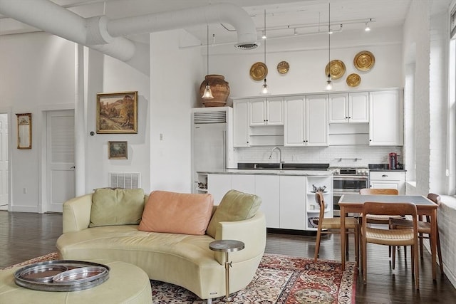 150 Moody St Unit 34, Waltham, MA 02453 - living room with dark wood-type flooring and a high ceiling