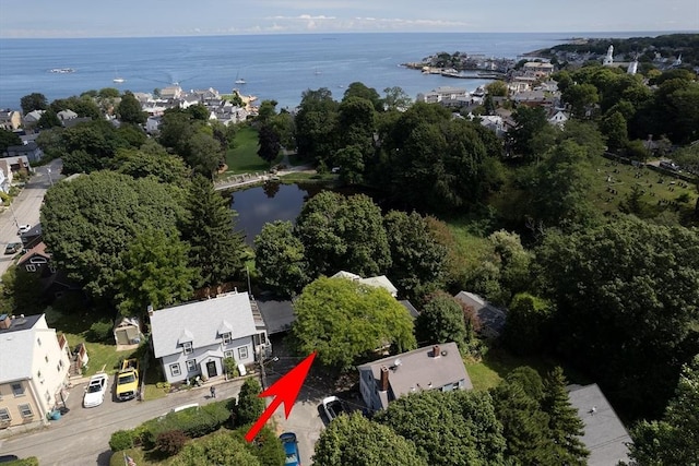 birds eye view of property featuring a water view