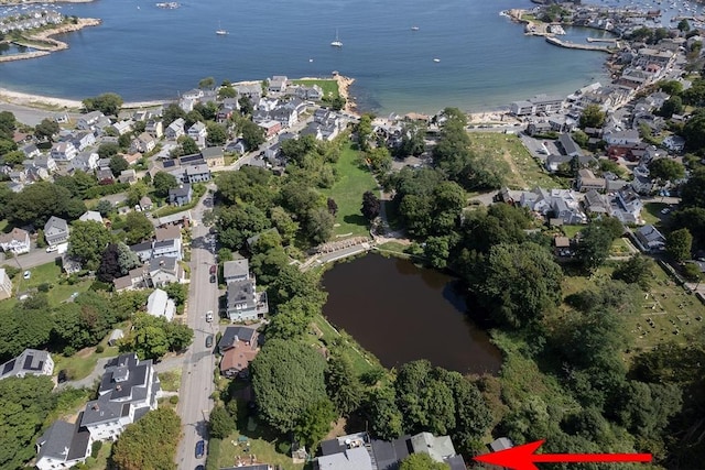 aerial view featuring a residential view and a water view