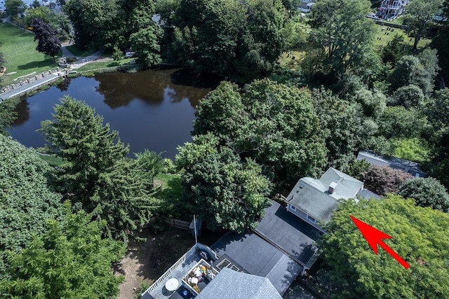 birds eye view of property featuring a water view